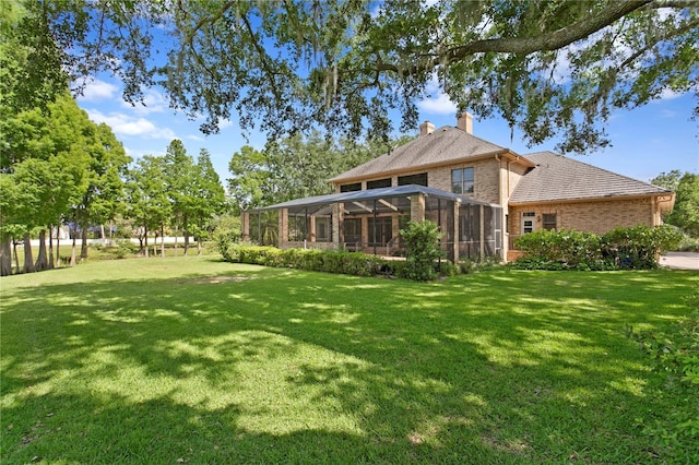 view of yard featuring a sunroom