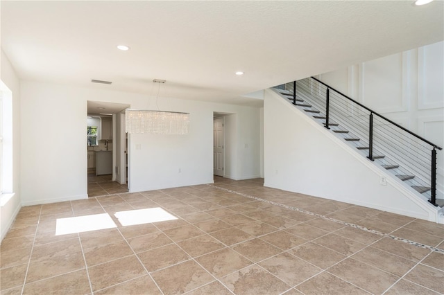 14319 Morristown Ave, Port Charlotte, FL 33981 - unfurnished living room with stairs, recessed lighting, light tile patterned flooring, healthy amount of natural light, and baseboards