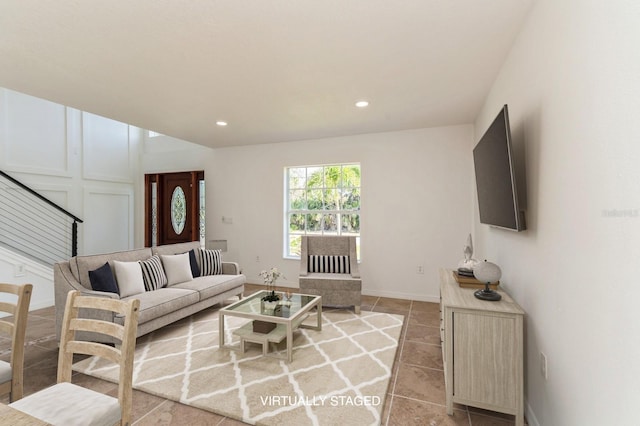 14319 Morristown Ave, Port Charlotte, FL 33981 - living area featuring light tile patterned floors, recessed lighting, and baseboards
