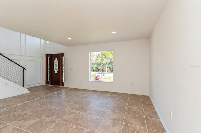14319 Morristown Ave, Port Charlotte, FL 33981 - foyer entrance with stairway, recessed lighting, and light tile patterned flooring