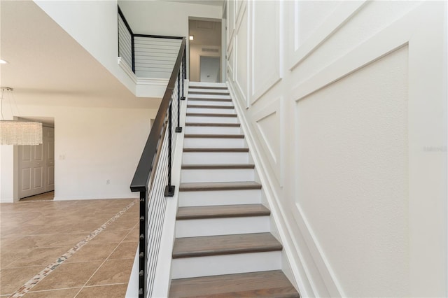 14319 Morristown Ave, Port Charlotte, FL 33981 - staircase with baseboards, inlaid floor details, and recessed lighting