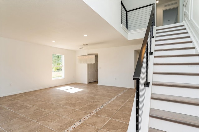 14319 Morristown Ave, Port Charlotte, FL 33981 - staircase with tile patterned flooring, recessed lighting, and baseboards