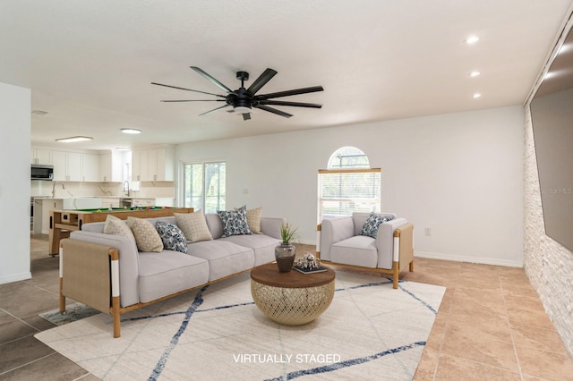 14319 Morristown Ave, Port Charlotte, FL 33981 - living area with plenty of natural light, light tile patterned floors, recessed lighting, ceiling fan, and baseboards