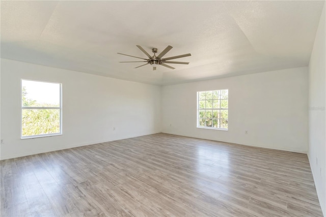 14319 Morristown Ave, Port Charlotte, FL 33981 - empty room featuring ceiling fan and light wood-style floors