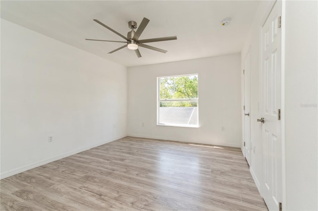 14319 Morristown Ave, Port Charlotte, FL 33981 - empty room featuring ceiling fan, light wood-style flooring, and baseboards