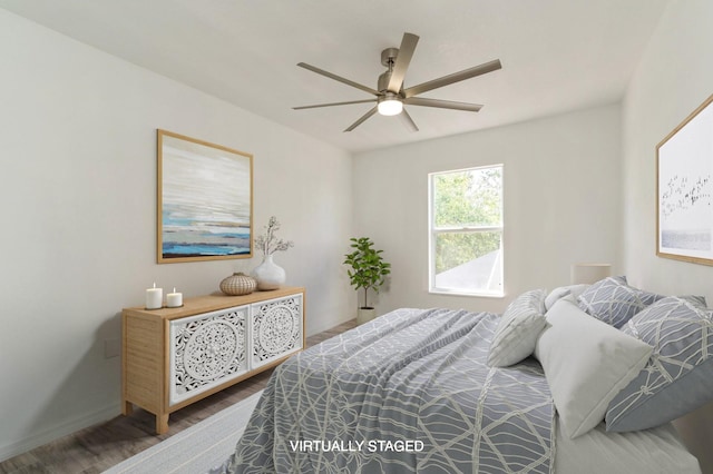 14319 Morristown Ave, Port Charlotte, FL 33981 - bedroom featuring wood finished floors, baseboards, and a ceiling fan