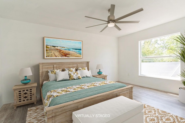 14319 Morristown Ave, Port Charlotte, FL 33981 - bedroom featuring wood finished floors, baseboards, and ceiling fan