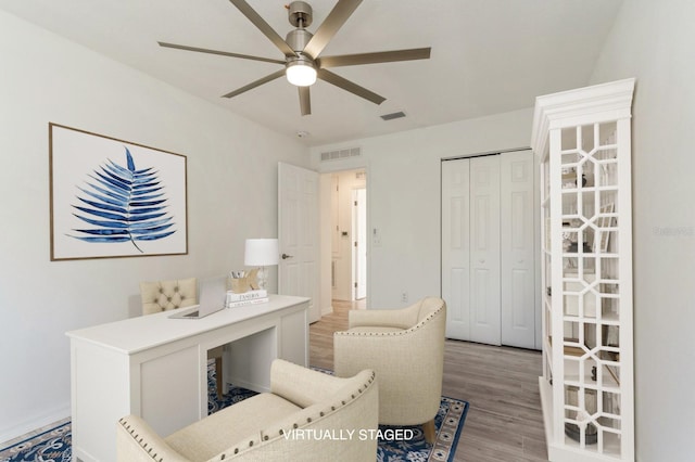 14319 Morristown Ave, Port Charlotte, FL 33981 - office space featuring ceiling fan and light wood-type flooring