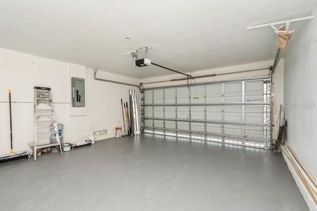 14319 Morristown Ave, Port Charlotte, FL 33981 - garage with electric panel and a garage door opener