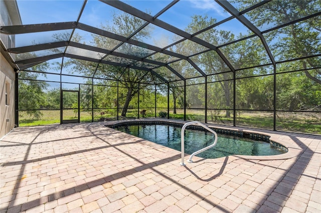 14319 Morristown Ave, Port Charlotte, FL 33981 - outdoor pool featuring a patio area and glass enclosure