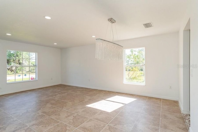 14319 Morristown Ave, Port Charlotte, FL 33981 - spare room featuring recessed lighting, baseboards, and light tile patterned flooring