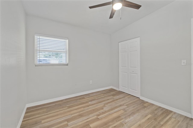 7139 Adare Dr, New Port Richey, FL 34653 - empty room with light wood-style flooring, baseboards, and ceiling fan