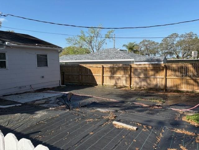1408 San Juan Ct, Clearwater, FL 33756 - wooden terrace featuring a fenced backyard