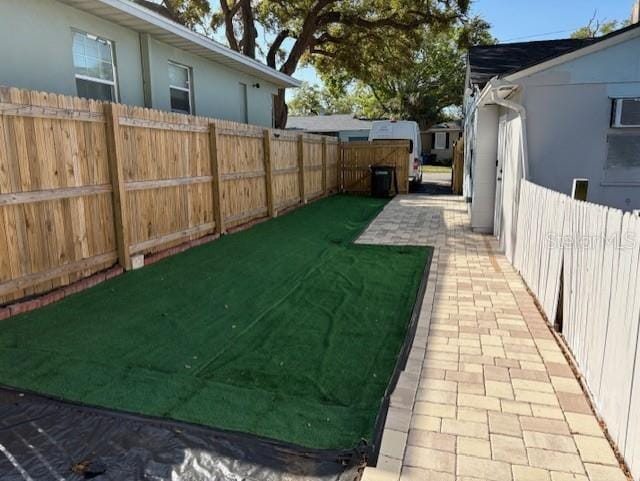 1408 San Juan Ct, Clearwater, FL 33756 - view of yard featuring a patio
