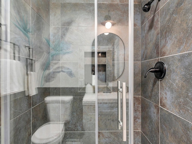 bathroom featuring a stall shower