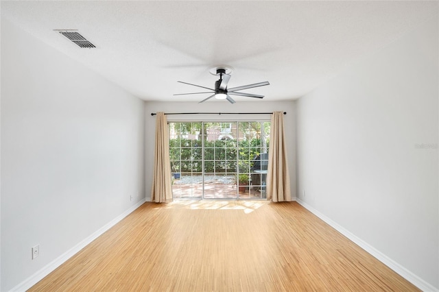 2314 S Clewis Ct Unit 106, Tampa, FL 33629 - unfurnished room with ceiling fan, wood finished floors, and baseboards