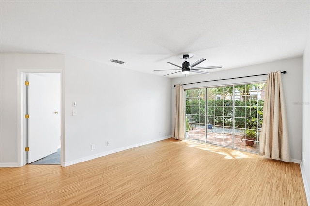 2314 S Clewis Ct Unit 106, Tampa, FL 33629 - spare room with light wood finished floors, a ceiling fan, and baseboards