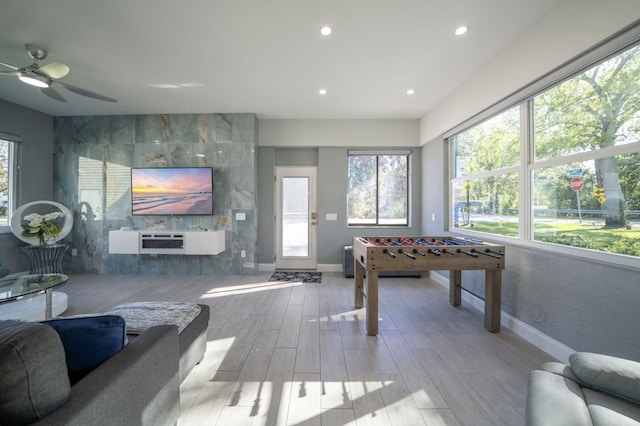 3986 Bennett Ln, Bonita Springs, FL 34134 - playroom with wood tiled floor, ceiling fan, recessed lighting, and baseboards
