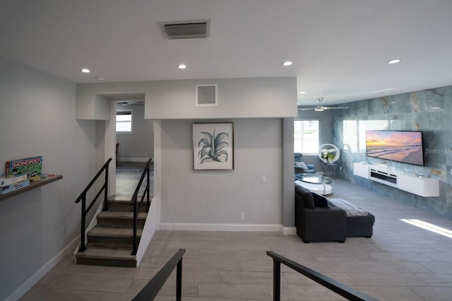 3986 Bennett Ln, Bonita Springs, FL 34134 - stairs with recessed lighting, a healthy amount of sunlight, and visible vents