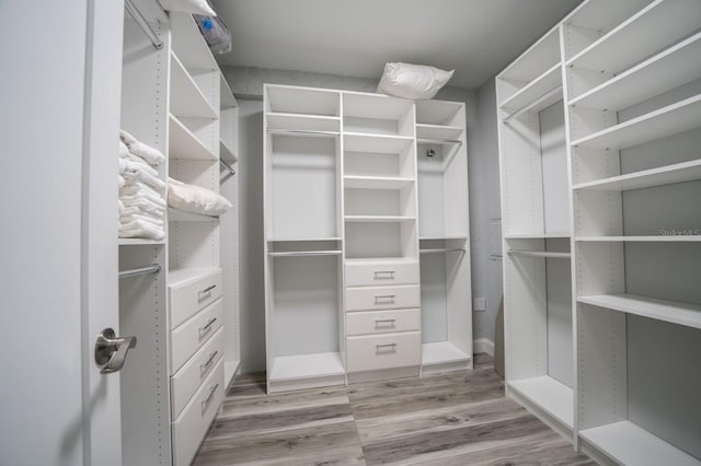 3986 Bennett Ln, Bonita Springs, FL 34134 - walk in closet featuring wood finished floors