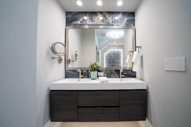 3986 Bennett Ln, Bonita Springs, FL 34134 - bathroom featuring double vanity, recessed lighting, and a sink