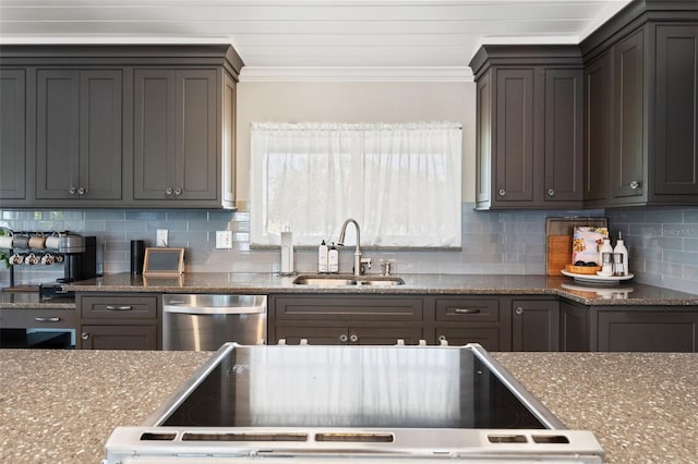 kitchen with dishwasher, a sink, crown molding, and decorative backsplash