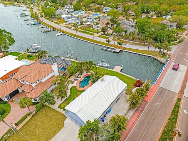 aerial view featuring a residential view and a water view