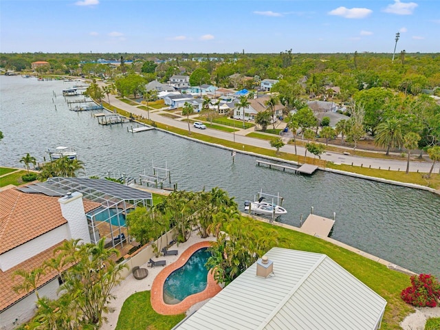 aerial view featuring a residential view and a water view