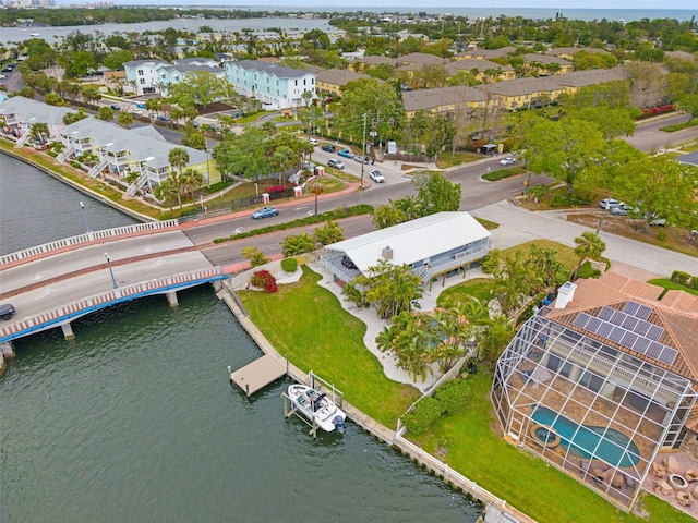 aerial view with a residential view and a water view