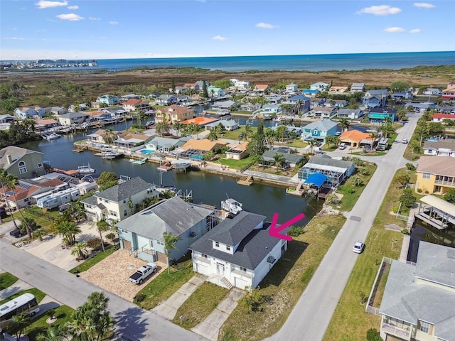 15621 Bertram Dr, Hudson, FL 34667 - aerial perspective of suburban area with a nearby body of water