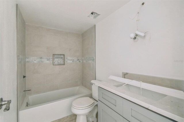 15621 Bertram Dr, Hudson, FL 34667 - full bath featuring toilet, shower / bath combination, and vanity