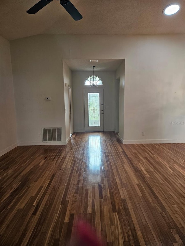 607 Manchester Woods Dr Unit 84, Sun City Center, FL 33573 - foyer entrance featuring dark wood-type flooring, baseboards, and ceiling fan