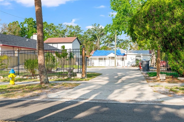 8615 Jackson Springs Rd, Tampa, FL 33615 - view of front of house featuring driveway and fence