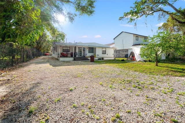 8615 Jackson Springs Rd, Tampa, FL 33615 - back of house with fence