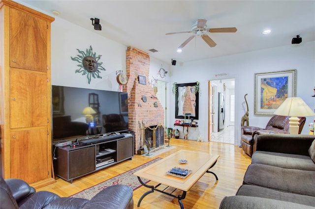 921 24th Ave N, Saint Petersburg, FL 33704 - living area featuring ceiling fan, light wood-style floors, recessed lighting, and a brick fireplace