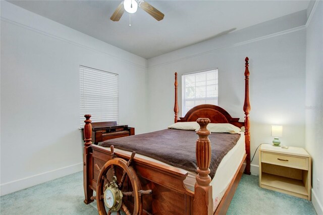 921 24th Ave N, Saint Petersburg, FL 33704 - carpeted bedroom with baseboards and ceiling fan