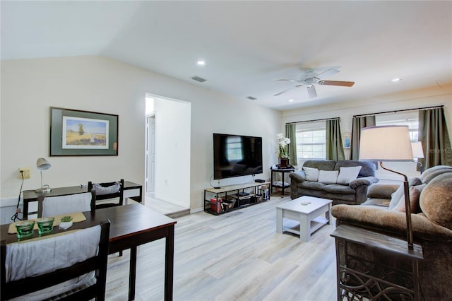 921 24th Ave N, Saint Petersburg, FL 33704 - living area featuring a ceiling fan, light wood-type flooring, vaulted ceiling, baseboards, and recessed lighting