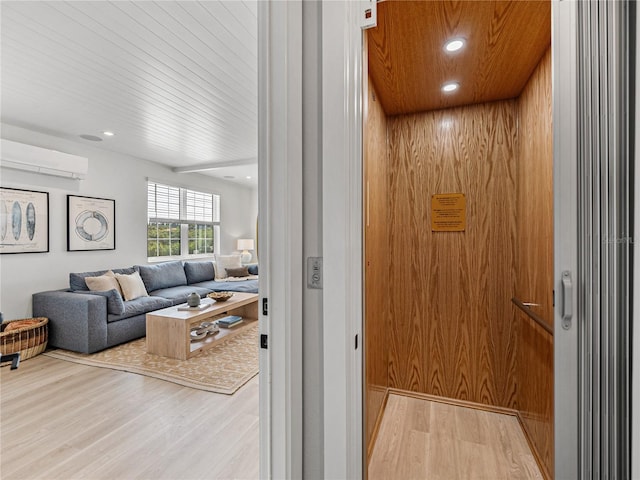 4215 Saltwater Pearl Way, Cortez, FL 34215 - elevator featuring an AC wall unit, wood finished floors, and recessed lighting