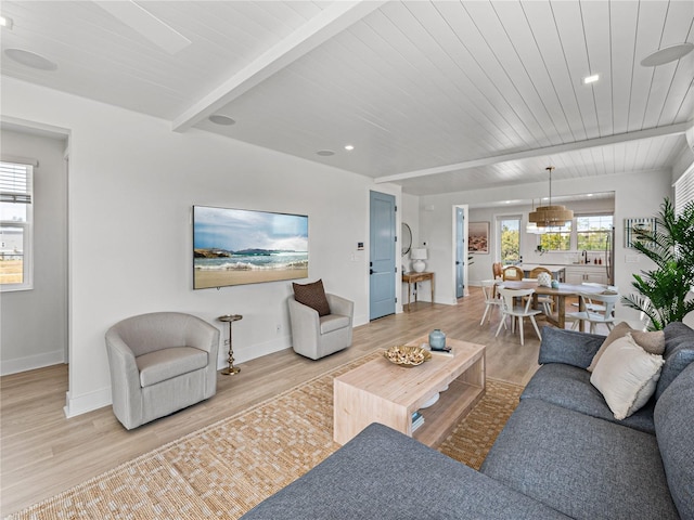 4215 Saltwater Pearl Way, Cortez, FL 34215 - living area with light wood finished floors, recessed lighting, and a wood ceiling with exposed beams
