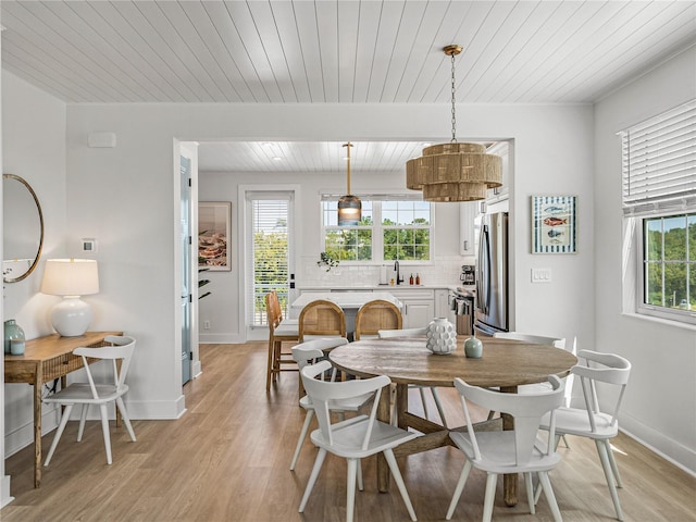 4215 Saltwater Pearl Way, Cortez, FL 34215 - dining space featuring wooden ceiling, light wood finished floors, and healthy amount of natural light