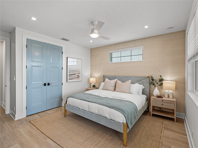 4215 Saltwater Pearl Way, Cortez, FL 34215 - bedroom featuring a closet, light wood-style flooring, ceiling fan, and recessed lighting