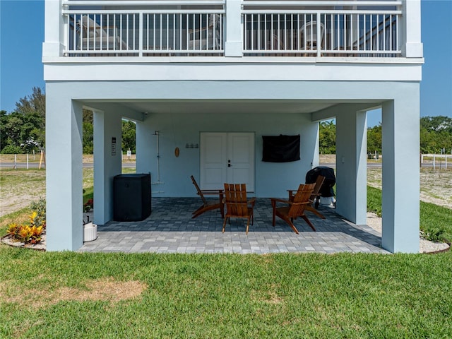 4215 Saltwater Pearl Way, Cortez, FL 34215 - patio / terrace with a patio, a lawn, and a carport