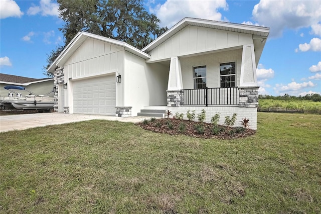 view of front of house featuring board and batten siding, driveway, a front lawn, a porch, and a garage