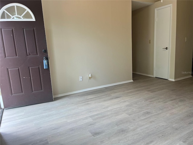 8804 Briar Hollow Ct, Tampa, FL 33634 - interior space with baseboards and wood finished floors