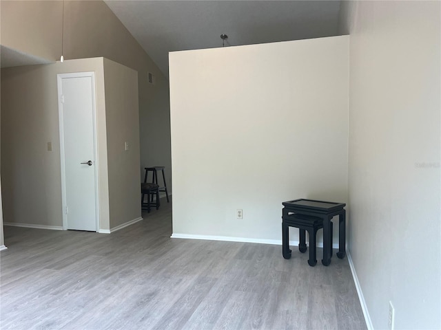 8804 Briar Hollow Ct, Tampa, FL 33634 - additional living space with baseboards, wood finished floors, and lofted ceiling
