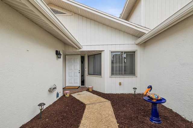 456 Lakeview Dr Unit 5, Palm Harbor, FL 34683 - doorway to property with stucco siding