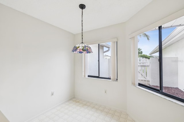 456 Lakeview Dr Unit 5, Palm Harbor, FL 34683 - spare room with light floors and baseboards