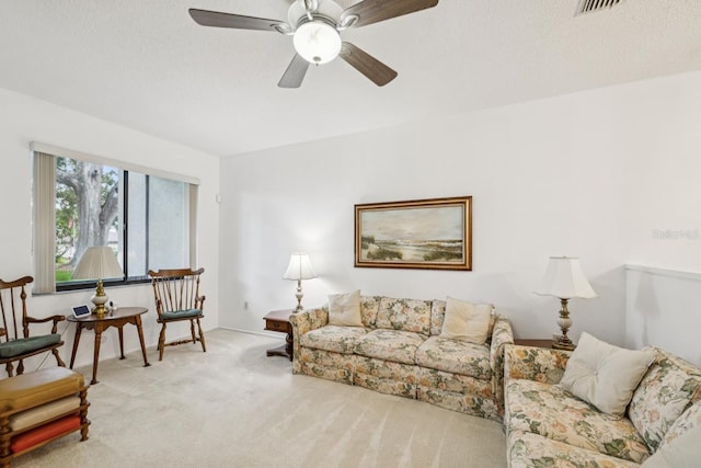 456 Lakeview Dr Unit 5, Palm Harbor, FL 34683 - living room featuring carpet and a ceiling fan