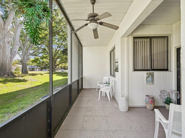 456 Lakeview Dr Unit 5, Palm Harbor, FL 34683 - sunroom with ceiling fan and plenty of natural light