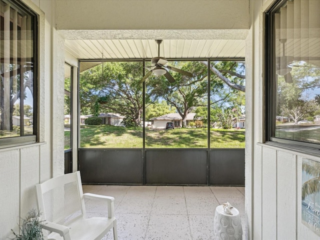 456 Lakeview Dr Unit 5, Palm Harbor, FL 34683 - unfurnished sunroom featuring ceiling fan